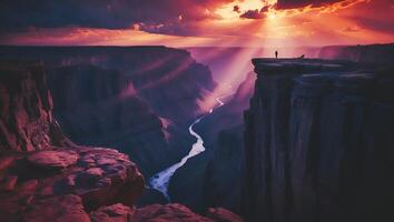 Grand Canyon View with River, Sunlight and Person Silhouette photo