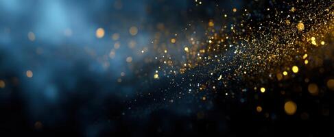 The mesmerizing golden particles shimmering against a deep blue background. photo