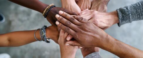 The harmonious gathering of diverse hands representing unity and collaboration. photo