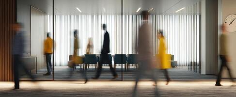 The blurred movement of professionals in a modern office setting. photo