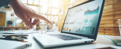 The laptop displaying detailed analytics and statistics for business insights. photo