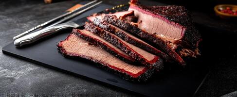 The deliciously smoked brisket sliced to perfection on a rustic platter photo