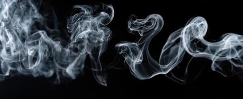 The Fluid Dance of Smoke Against a Dark Background photo