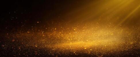 The sparkling golden dust illuminated by soft light beams in a dark setting photo