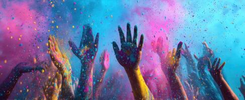 The vibrant celebration of colors with raised hands at a joyful festival. photo