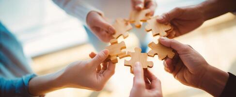 The collaborative effort of hands joining puzzle pieces in unity and teamwork. photo