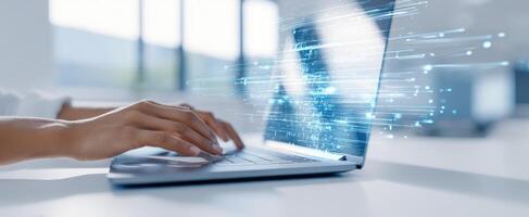 The laptop displaying a dynamic interface with data and digital interaction. photo