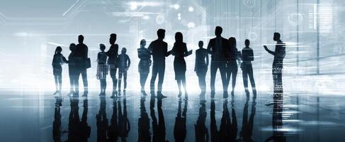 The silhouettes of professionals collaborating in a futuristic business environment. photo