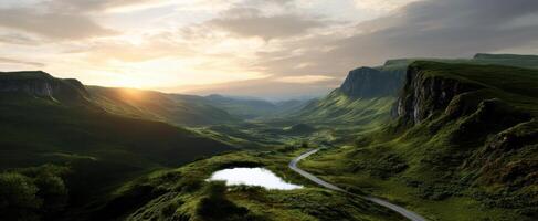 The breathtaking landscape of a serene valley at sunset with winding roads. photo