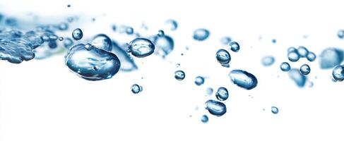 The shimmering water droplets creating a dynamic splash effect on a white background. photo