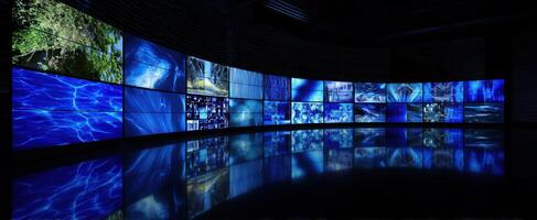 The immersive display of vibrant digital imagery in a modern exhibition space. photo