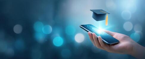 The smartphone displays a graduation cap symbolizing digital education and achievement. photo