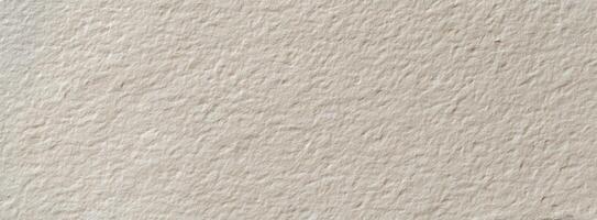 The textured surface of handmade paper for creative projects and designs. photo