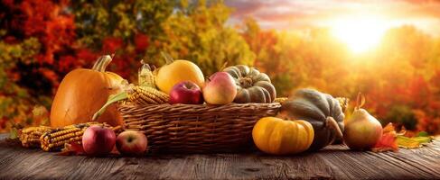 The Autumn Harvest Basket Filled with Fresh Fruits and Pumpkins photo