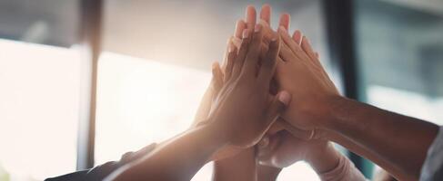 The Hands of Unity Celebrating Teamwork and Collaboration in a Business Setting photo