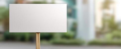 The blank signboard ready for customizable advertisements in a vibrant outdoor setting. photo