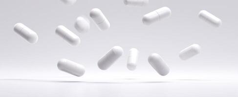 The floating white capsules representing modern health and wellness solutions. photo