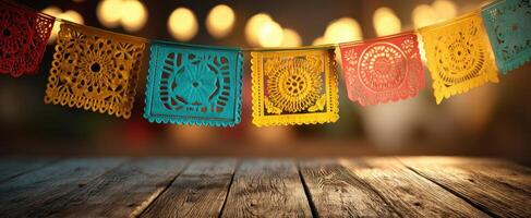 The colorful papel picado decorations enhancing a joyful celebration atmosphere. photo