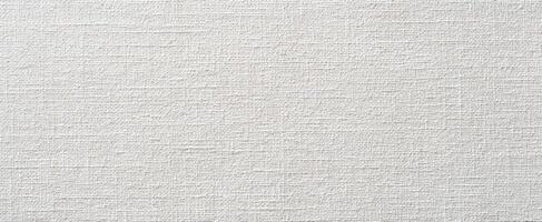 The elegant textured fabric surface in soft white tones for design applications photo