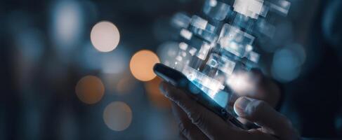 The smartphone displaying a futuristic digital interface in a dark environment. photo