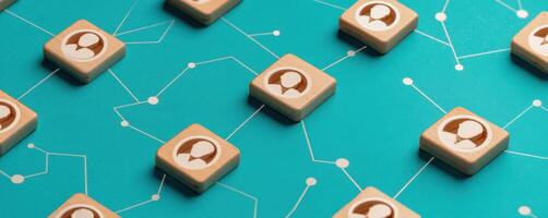 The interconnected wooden icons representing user profiles on a digital network. photo