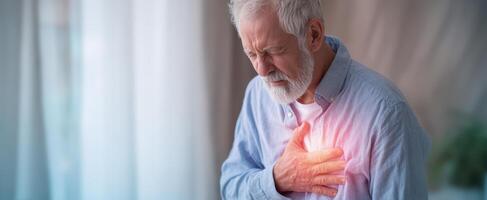 The elderly man experiencing chest pain in a cozy indoor setting. photo