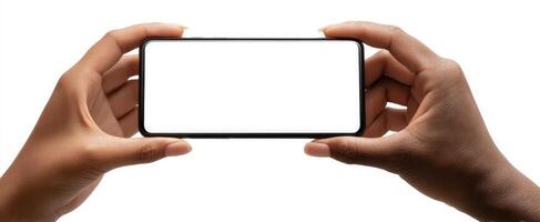 The hands holding a smartphone with a blank screen for creative use photo