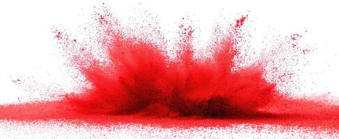 The vibrant red powder explosion creating an artistic and dynamic visual effect. photo