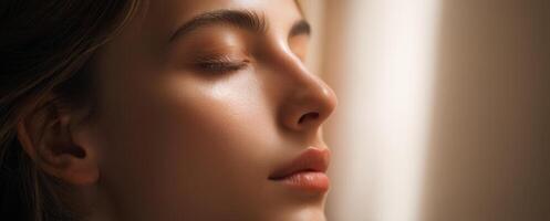 The serene beauty of a woman enjoying a moment of peaceful reflection. photo