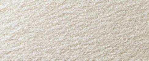 The textured surface of handcrafted paper with a soft, neutral appearance photo
