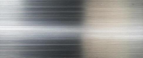 The sleek brushed metal surface with elegant reflective qualities. photo