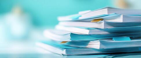The Stacked Papers Waiting for Organization in a Modern Office Setting photo