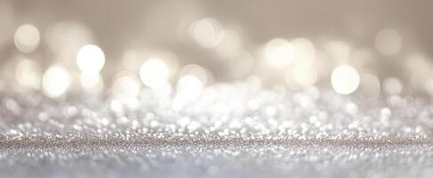 The sparkling silver surface illuminated by beautiful bokeh lights. photo