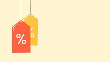 Looping animation of red and yellow discount labels swaying on a string, with percentage signs. Ideal for sales promotions or marketing content. video