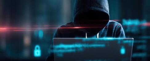 The hooded hacker working on a laptop in a digital environment. photo