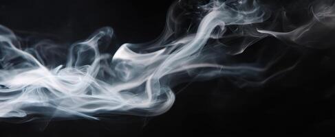 The Captivating Dance of Smoke Against a Dark Background photo