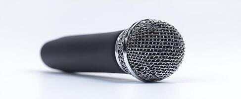 The microphone resting on a clean, minimalist background ready for a performance photo