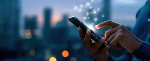 The smartphone illuminating digital connections in an urban nighttime setting. photo