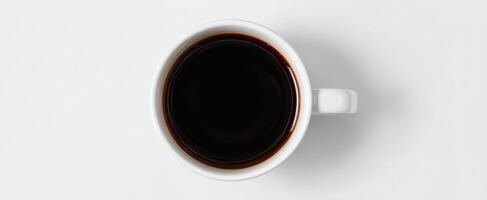 The sleek black coffee mug on a simple white background. photo