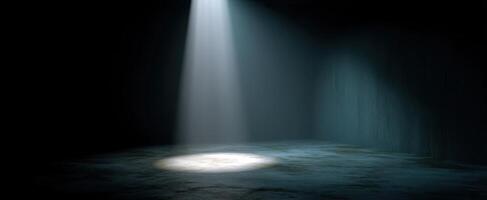 The Spotlight Illuminating an Empty Stage in a Darkened Room photo