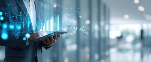The business professional analyzing data trends using a digital tablet in a modern office photo