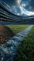Beautifully manicured baseball field under dramatic skies during early evening hours before a game starts photo
