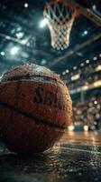 Close-up of a basketball glistening with water droplets during an intense game in a lively arena with enthusiastic fans photo