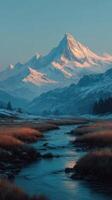 Majestic snow-capped mountains reflect in a tranquil river at dawn in a serene landscape photo