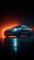 Sleek car stands out in dark studio illuminated by vibrant orange and blue lights photo