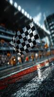 Checkered flag waves at the finish line on a racetrack during a thrilling motorsport event in the early afternoon sun photo