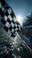 Checkered flag waves at the finish line signaling the end of an exciting race in a vibrant atmosphere photo