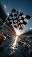 Checkered flag marking the finish line at a vibrant race track during sunset with cars speeding by photo