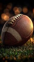 Close-up view of an American football resting on green grass in a dynamic sports environment photo