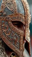 Ornate helmet worn by a warrior showcasing intricate designs during a historical reenactment event at a medieval festival photo